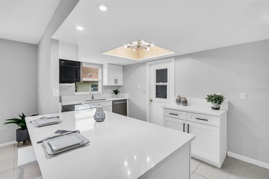 Fully updated 2-bedroom, 2-bath villa with attached garage - photo 15