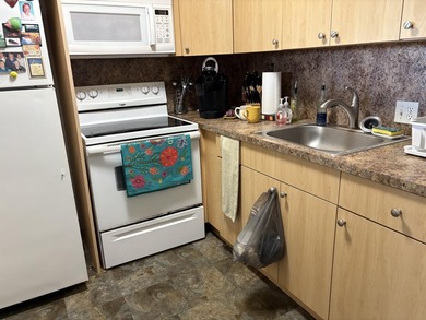 Discover this one-bedroom, one-and-a-half-bath condominium - photo 2