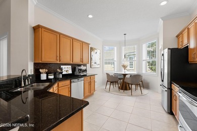 Set within the gated coastal community of Makarios, this - photo 9
