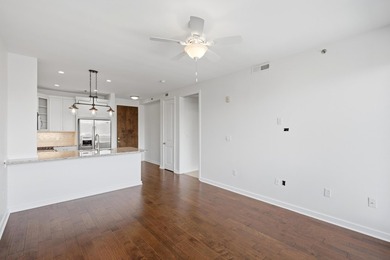Featuring a desired architectural layout, this one-bedroom condo - photo 3