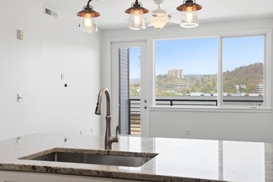 Featuring a desired architectural layout, this one-bedroom condo - photo 4
