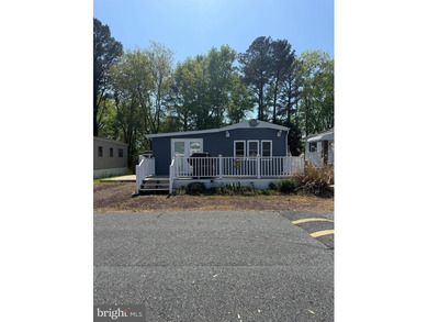 Welcome to White Horse Park ! Charming coastal cottage located - photo 4