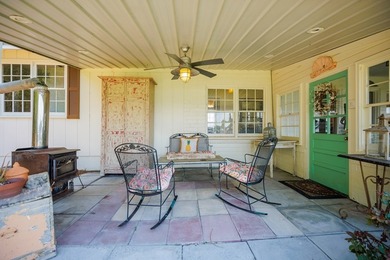 Tucked away on the shores of beautiful Long Pond, this adorable - photo 31