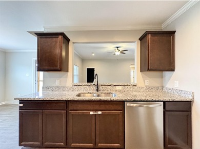 Discover this inviting, low-maintenance brick home in Hamilton - photo 11