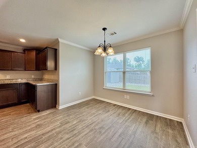 Discover this inviting, low-maintenance brick home in Hamilton - photo 13