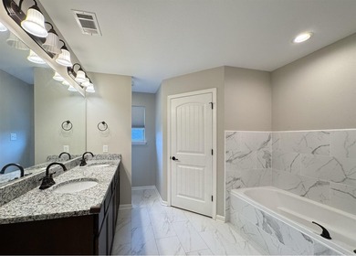 Discover this inviting, low-maintenance brick home in Hamilton - photo 18