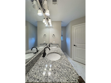 Discover this inviting, low-maintenance brick home in Hamilton - photo 19
