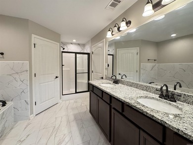Discover this inviting, low-maintenance brick home in Hamilton - photo 20