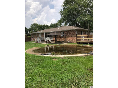 Great 4 bedroom 3 bath brick home in Ledbetter on nice level .67 - photo 7