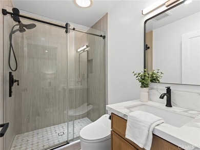 Beautifully Reimagined with a Warm Coastal-Modern Design, this - photo 29