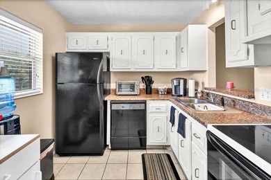 Step into this beautifully maintained 1-bedroom, 1.5-bath condo - photo 4