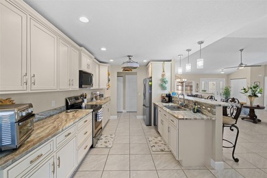 This beautifully updated 3-bedroom, 2.5 bathroom pool home is - photo 11