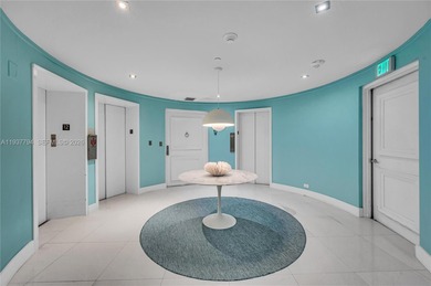 Iconic Bayfront living at the fully gated Palm Bay Towers with