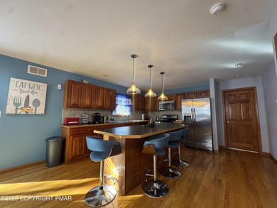 Welcome to this beautifully maintained Colonial style home