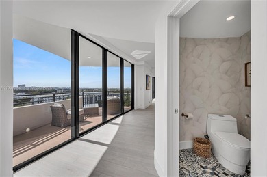 Iconic Bayfront living at the fully gated Palm Bay Towers with