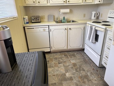 Welcome to this two-bedroom, one-and-a-half-bath waterfront - photo 2
