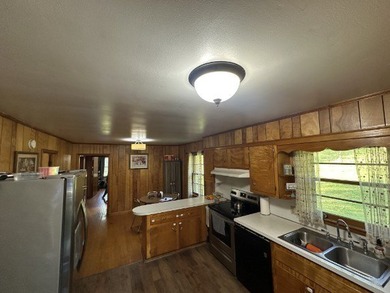 Nice 3 BR 1BH brick home with full size basement on 9.67 acres - photo 13