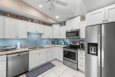 Move-in ready 2BR/2BA villa featuring a rare oversized 1.5-car - photo 1