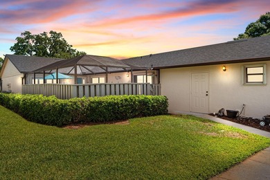 Move-in ready 2BR/2BA villa featuring a rare oversized 1.5-car - photo 2
