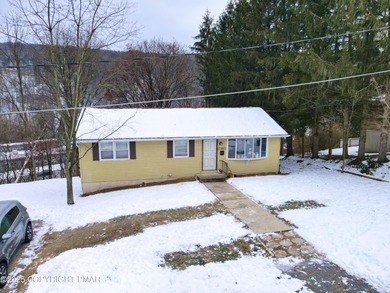 Check out this well-maintained three-bedroom, one-bath ranch
