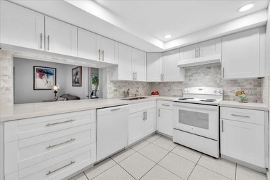 Rare FIRST FLOOR unit just steps away from the beach! You can - photo 2