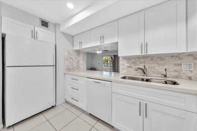 Rare FIRST FLOOR unit just steps away from the beach! You can - photo 3