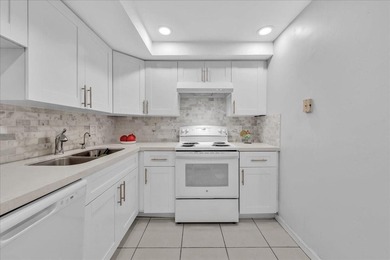 Rare FIRST FLOOR unit just steps away from the beach! You can - photo 4