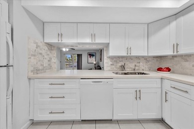 Rare FIRST FLOOR unit just steps away from the beach! You can - photo 5