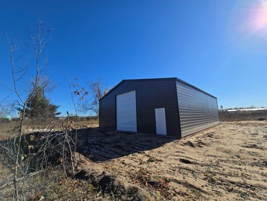 Fantastic 1.15-acre parcel located on main road, featuring a - photo 2