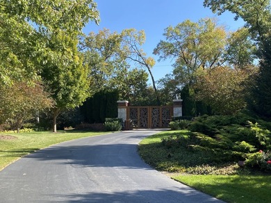 Gated Entry...Winding road in...Mature Landscaping hugging the - photo 52