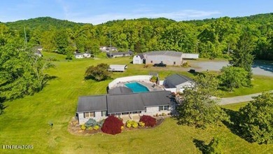 Motivated Sellers! This one has it all! Offering a rarely found - photo 1