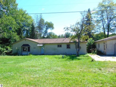 Lake Home For Sale in Weidman, Michigan