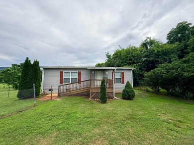 Charming 2BR/2BA home on .41 acres featuring owned solar panels - photo 1