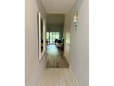 Welcome to this well-maintained 2-bedroom, 2-bath villa located - photo 3