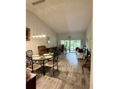 Welcome to this well-maintained 2-bedroom, 2-bath villa located - photo 4