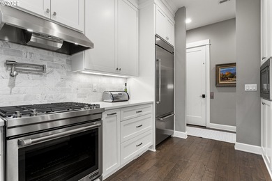 Modern, highly upgraded open-concept golf course condo with