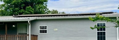 Charming 2BR/2BA home on .41 acres featuring owned solar panels - photo 5