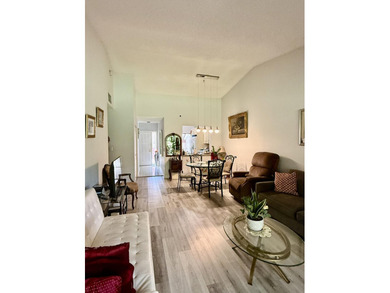 Welcome to this well-maintained 2-bedroom, 2-bath villa located - photo 5