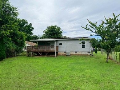 Charming 2BR/2BA home on .41 acres featuring owned solar panels - photo 7