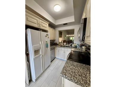 Welcome to this well-maintained 2-bedroom, 2-bath villa located - photo 8