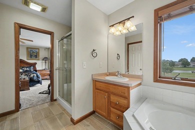 Enjoy picturesque golf course & pond views from this beautiful - photo 22