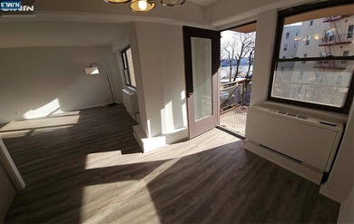 Live in it or rent it out. Sun-filled, all utilities included