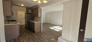 Live in it or rent it out. Sun-filled, all utilities included