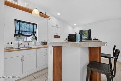 Welcome to this charming 2-bedroom, 1-bath home situated on a - photo 22