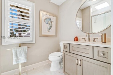 Lowcountry living at its finest! This beautifully maintained Sea