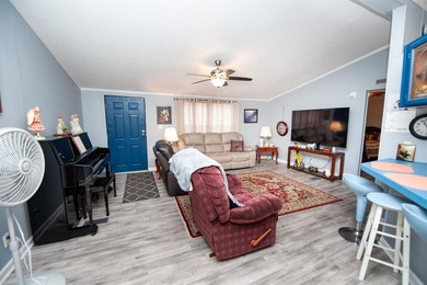 This 3 bedroom, 2 bath manufactured home is on a level .60 acre - photo 5