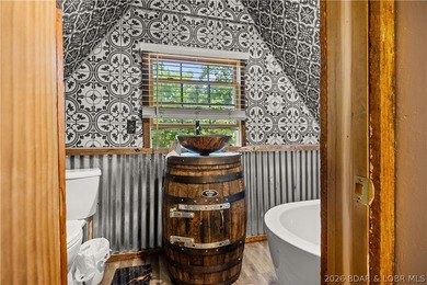 Escape to this adorable 2-bed, 2-bath rustic log cabin tucked - photo 15