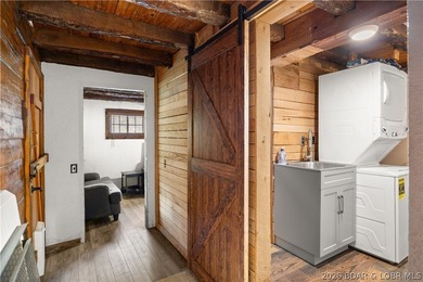 Escape to this adorable 2-bed, 2-bath rustic log cabin tucked - photo 17
