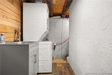 Escape to this adorable 2-bed, 2-bath rustic log cabin tucked - photo 18