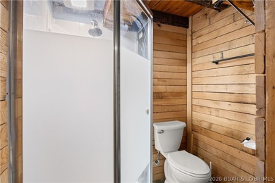 Escape to this adorable 2-bed, 2-bath rustic log cabin tucked - photo 19